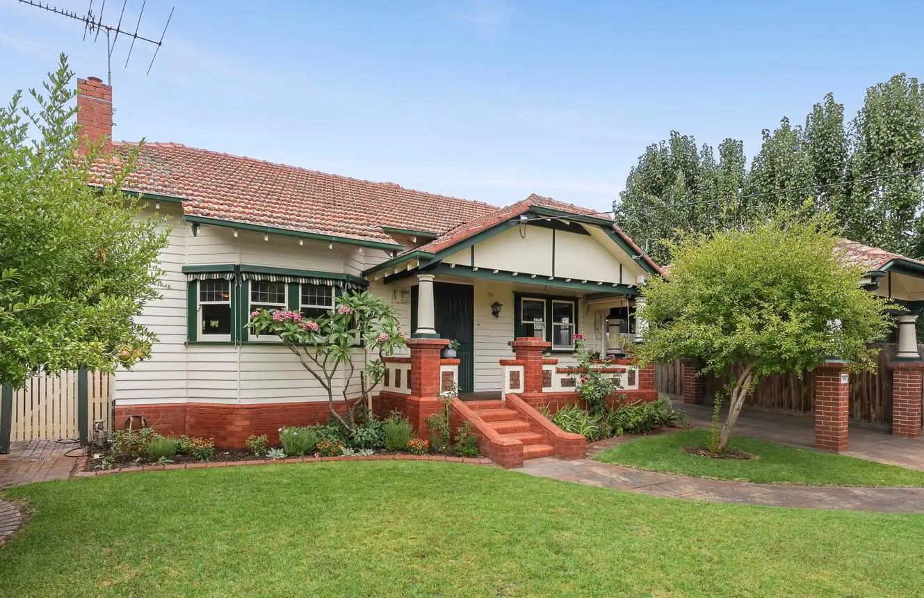 Charming suburban house with front garden.
